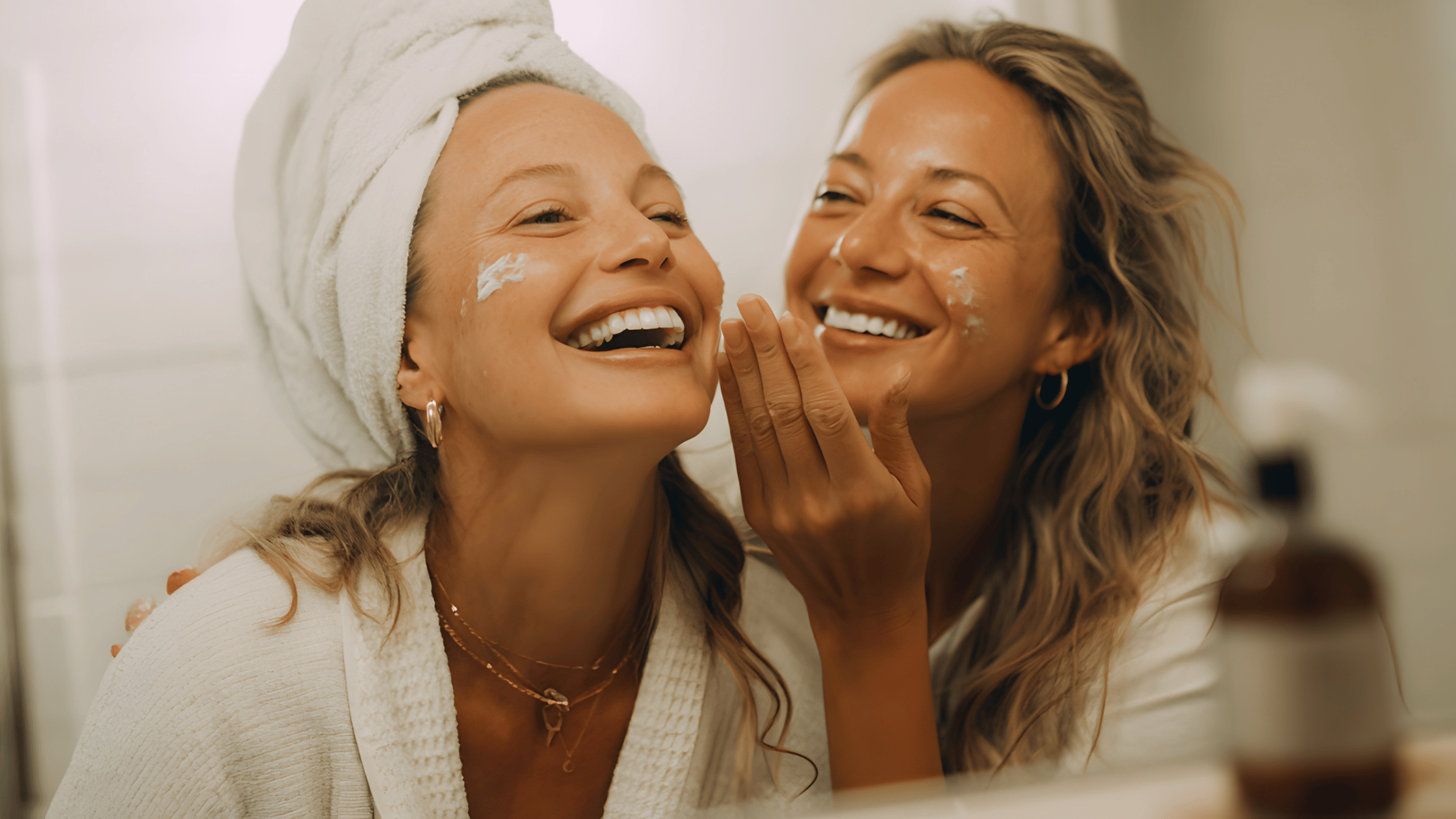 Women applying skincare in winter – Winter Skincare Guide by Sun & Skin