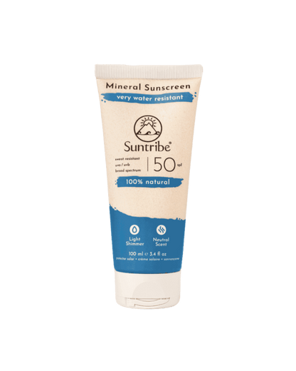Suntribe mineral sunscreen tube on a green background